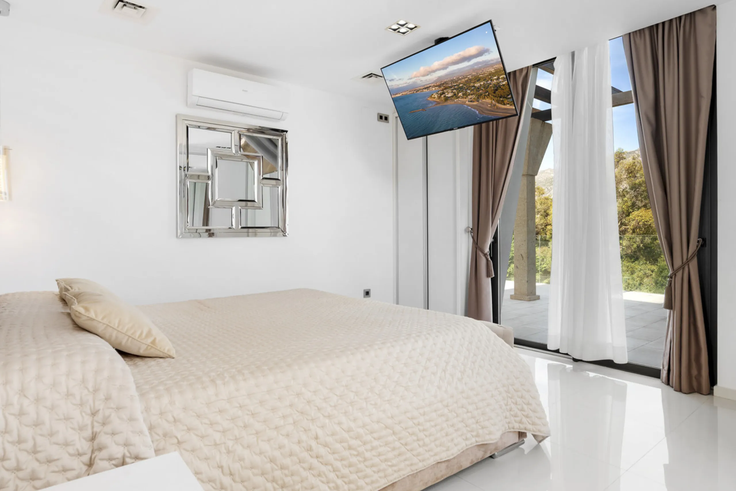 Nestled in the prestigious enclave of La Cerquilla, Villa La Cerquilla is a sanctuary of contemporary luxury surrounded by the beauty of Marbella's Golf Valley. Behind its private gates, the residence opens onto five generous double bedrooms, including a 