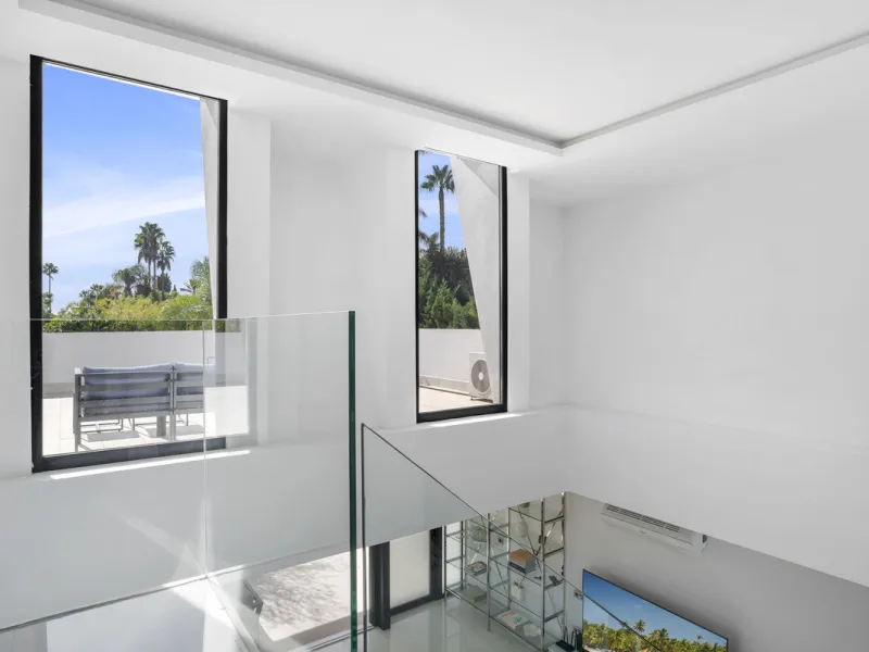 Nestled in the prestigious enclave of La Cerquilla, Villa La Cerquilla is a sanctuary of contemporary luxury surrounded by the beauty of Marbella's Golf Valley. Behind its private gates, the residence opens onto five generous double bedrooms, including a 