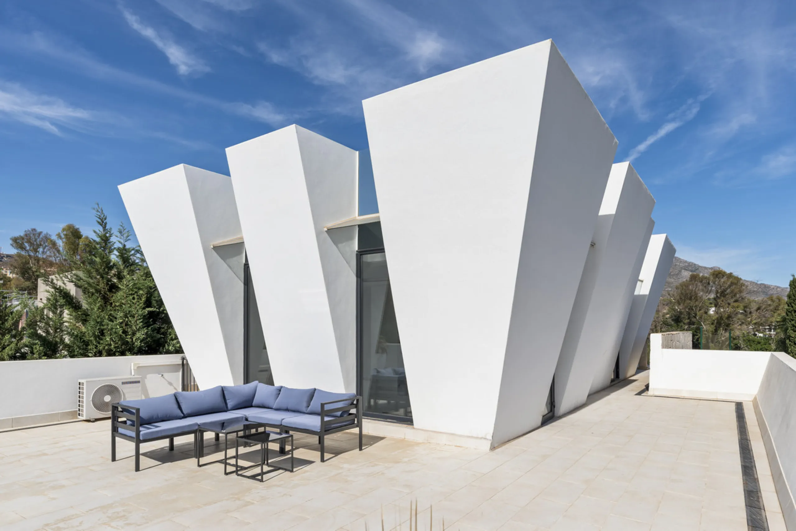Nestled in the prestigious enclave of La Cerquilla, Villa La Cerquilla is a sanctuary of contemporary luxury surrounded by the beauty of Marbella's Golf Valley. Behind its private gates, the residence opens onto five generous double bedrooms, including a 