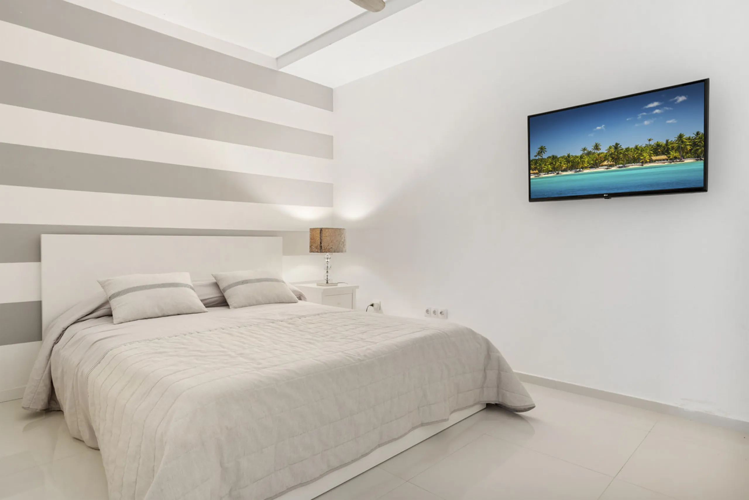 Nestled in the prestigious enclave of La Cerquilla, Villa La Cerquilla is a sanctuary of contemporary luxury surrounded by the beauty of Marbella's Golf Valley. Behind its private gates, the residence opens onto five generous double bedrooms, including a 