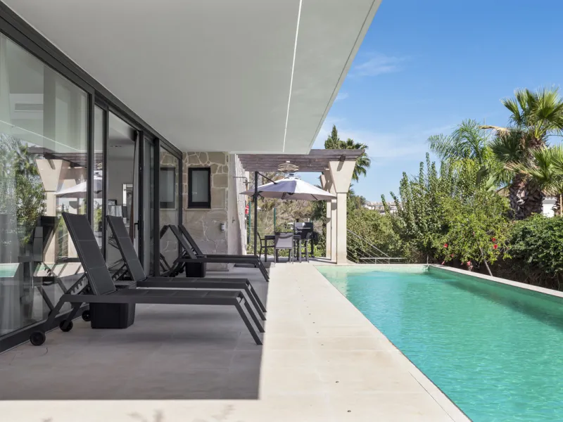 Nestled in the prestigious enclave of La Cerquilla, Villa La Cerquilla is a sanctuary of contemporary luxury surrounded by the beauty of Marbella's Golf Valley. Behind its private gates, the residence opens onto five generous double bedrooms, including a 