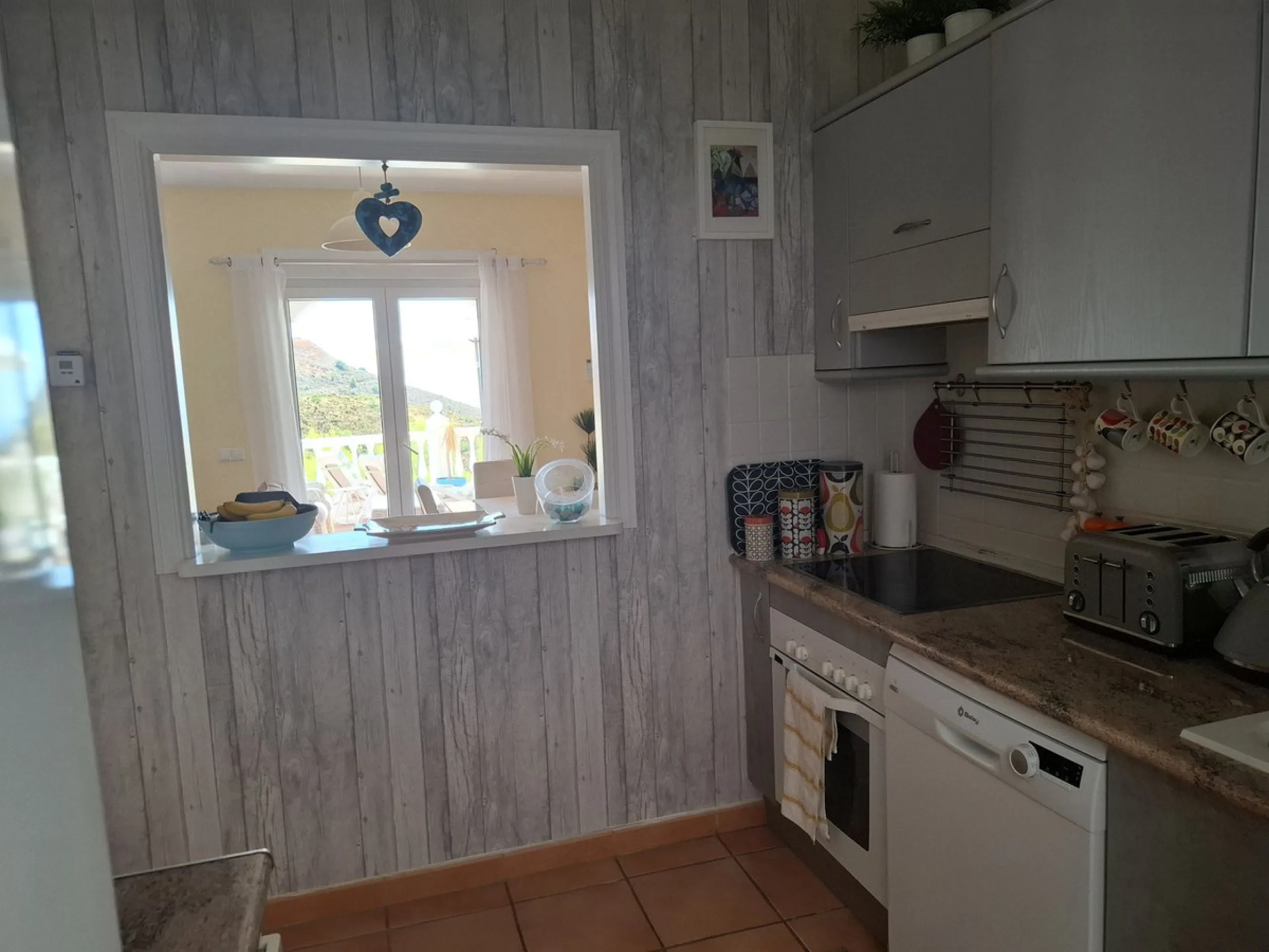 Charming 2-Bedroom Townhouse with Panoramic Views in Pueblo Valtocado, Mijas