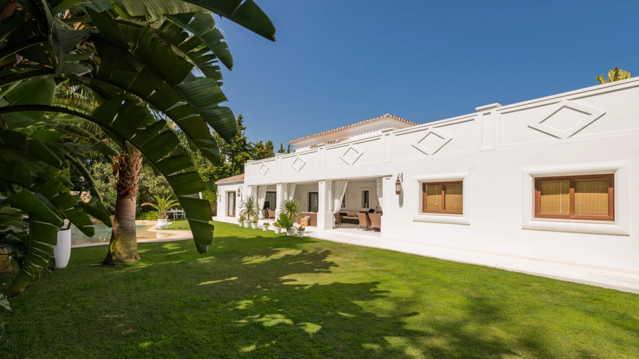 Impressive luxurious Andalusian style villa on the Atalaya beachside, a few steps from the beach.