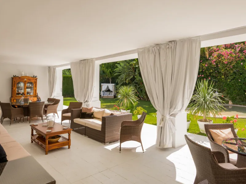 Impressive luxurious Andalusian style villa on the Atalaya beachside, a few steps from the beach.