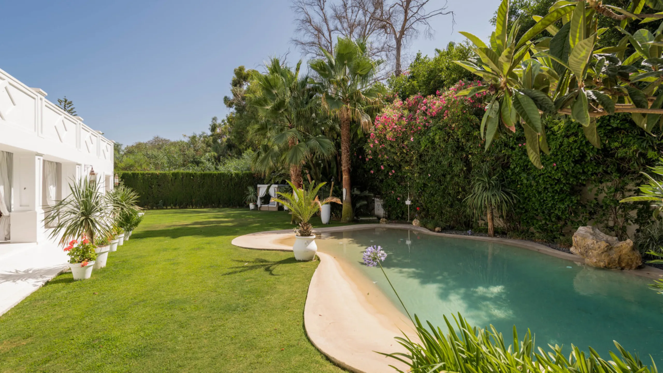 Impressive luxurious Andalusian style villa on the Atalaya beachside, a few steps from the beach.