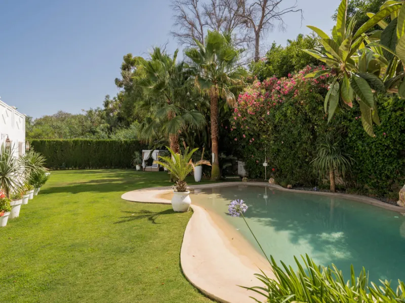 Impressive luxurious Andalusian style villa on the Atalaya beachside, a few steps from the beach.
