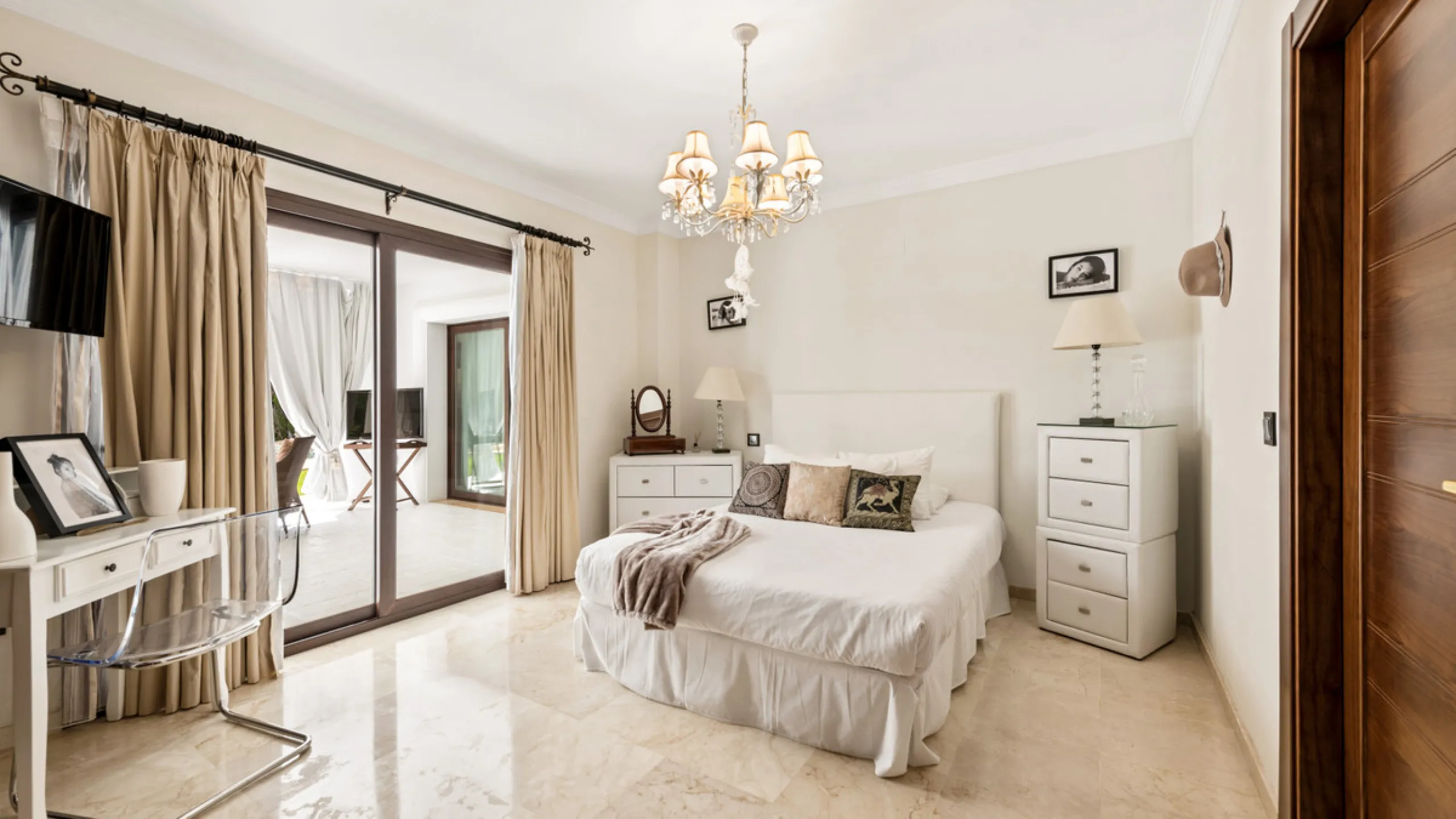 Impressive luxurious Andalusian style villa on the Atalaya beachside, a few steps from the beach.