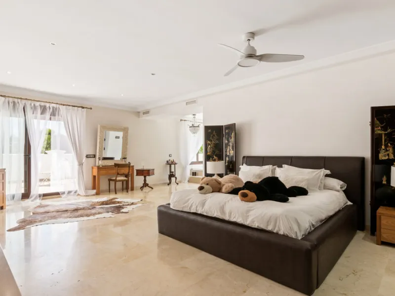 Impressive luxurious Andalusian style villa on the Atalaya beachside, a few steps from the beach.