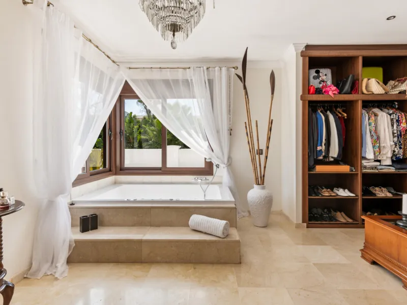 Impressive luxurious Andalusian style villa on the Atalaya beachside, a few steps from the beach.