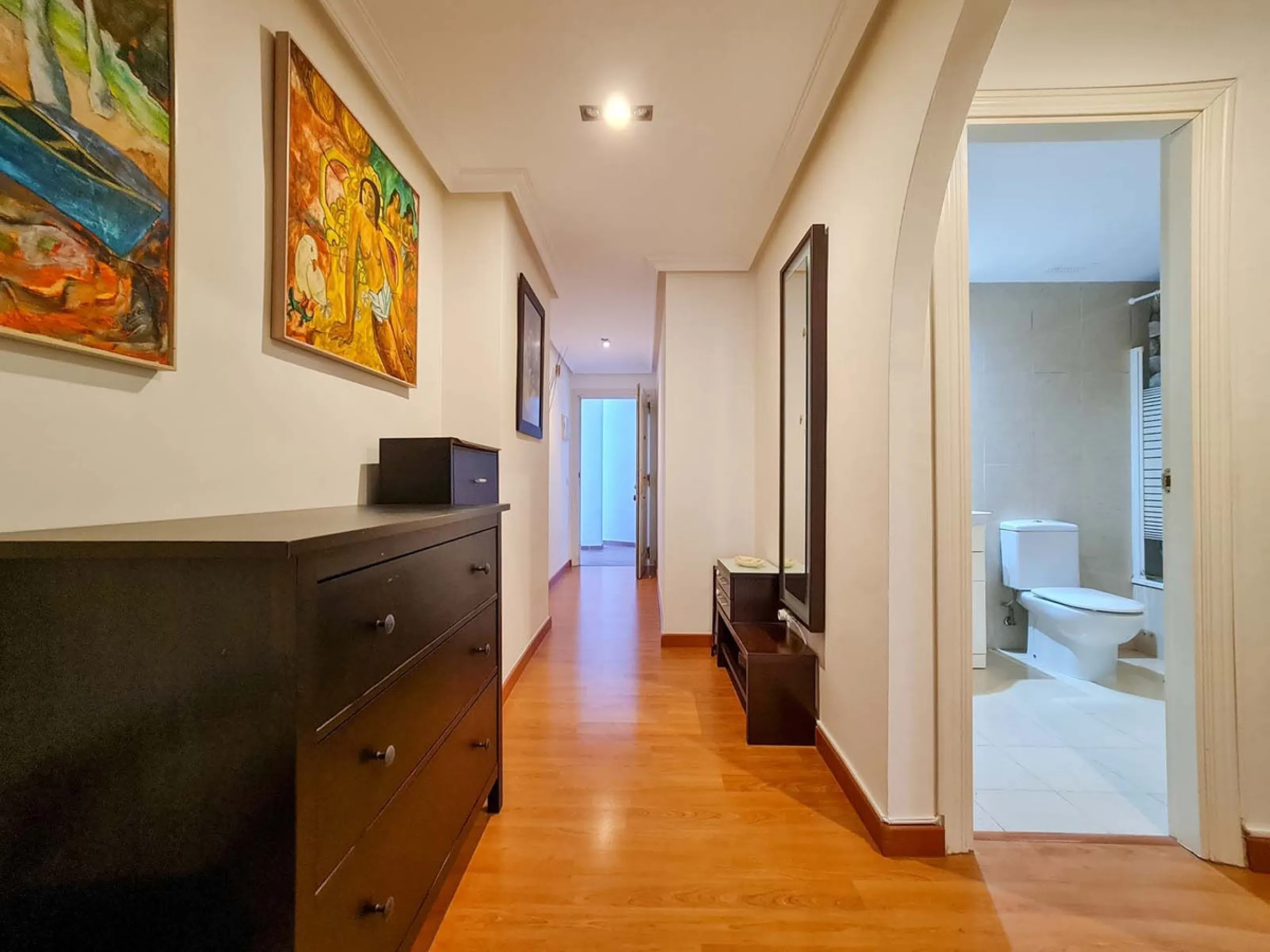 Elevated ground floor apartment in La Maestranza, Nueva Andalucia.  A closed development with 24 hour security, very well  maintained gardens and green areas with 2 pools (one of them heated).  Spacious apartment with parquet floors.  It could be converte