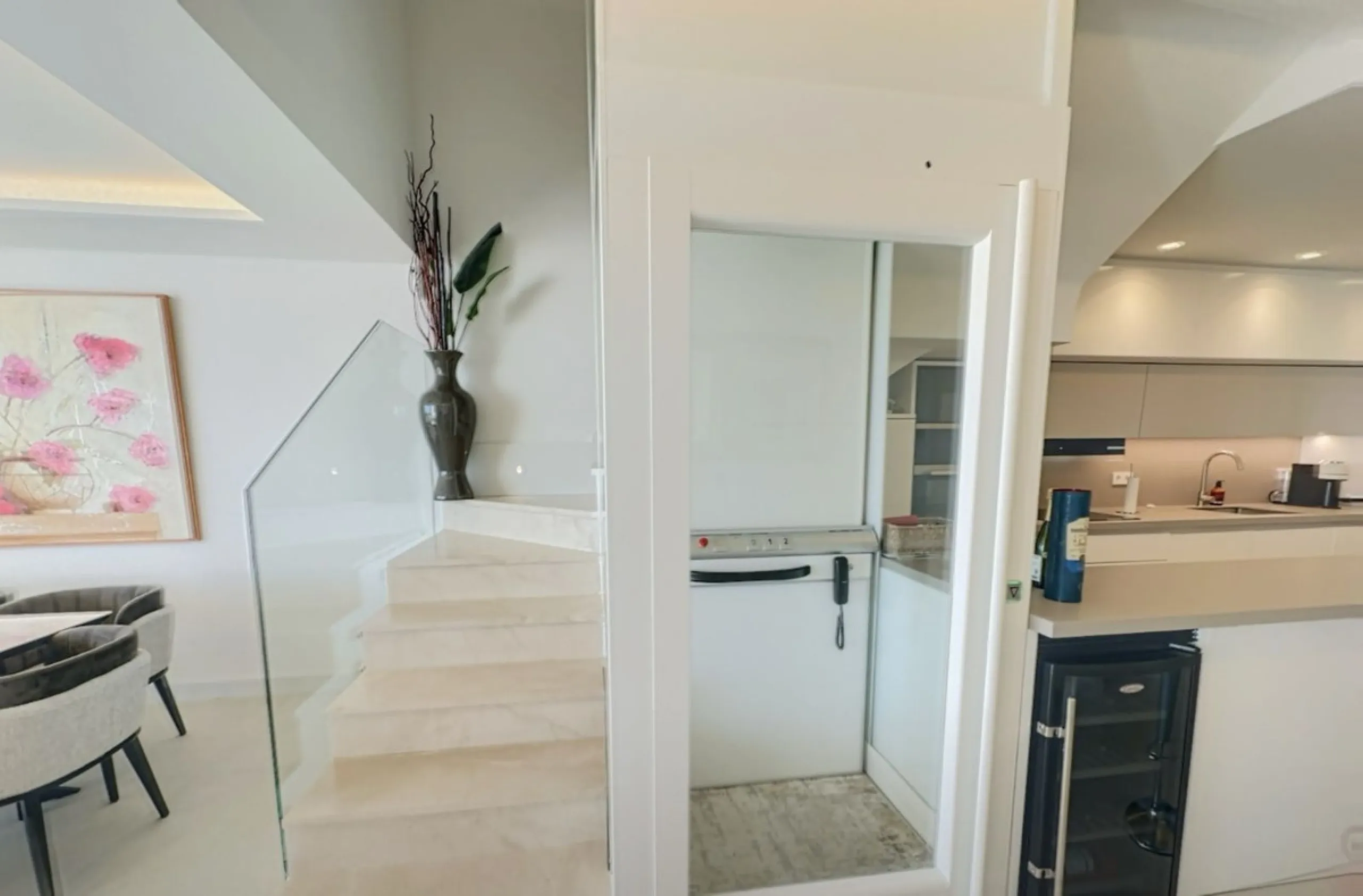 This exceptional triplex penthouse stands out as one of the most unique and meticulously designed properties in the Selwo area of Estepona. Its current owners, **renowned interior designers**, carried out a complete **bespoke, full-scale renovation**, ori