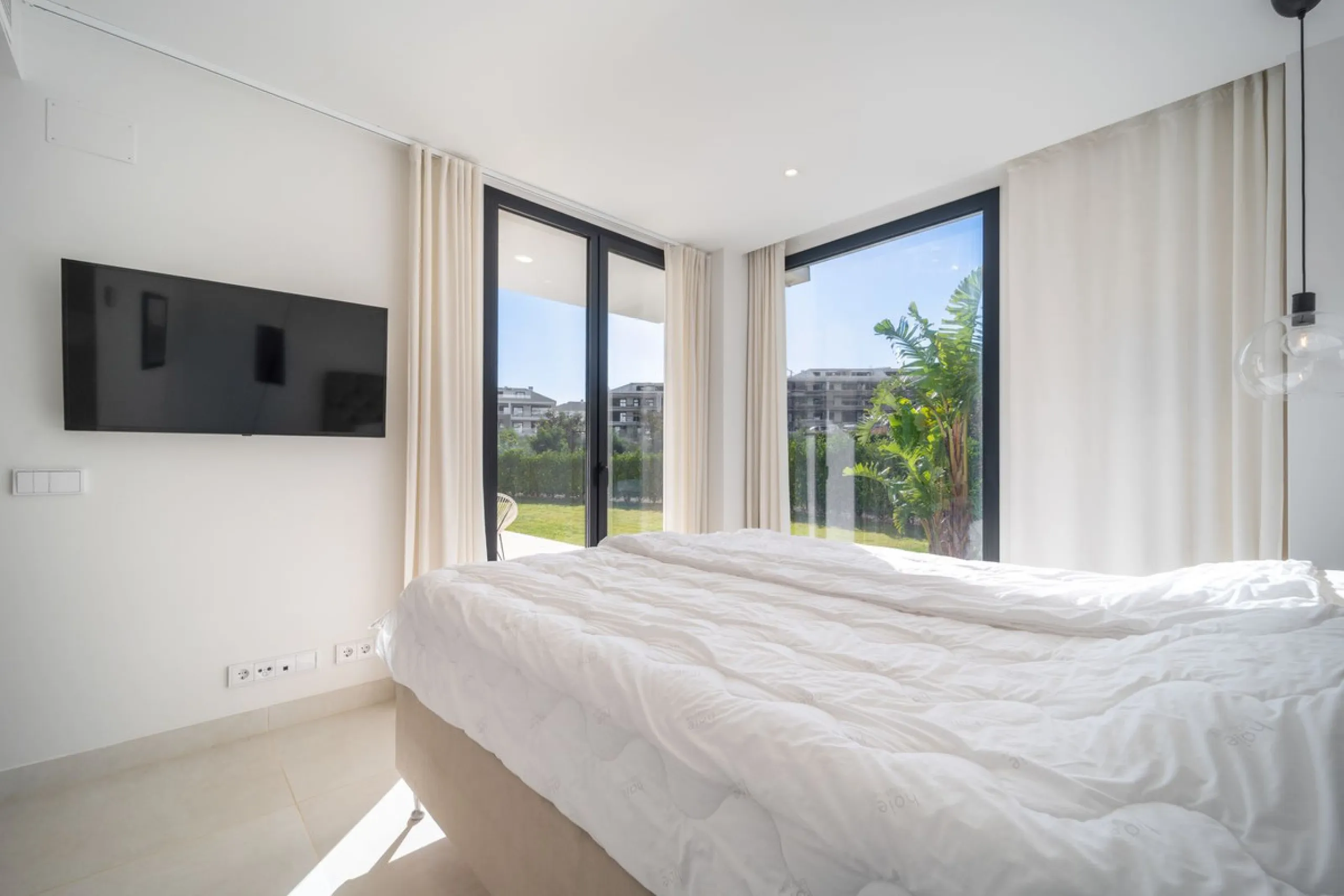 Stunning west facing corner garden apartment, with 3 bedrooms, and 2 bathrooms, spacious living-dining room, open plan kitchen fully furnished and equipped with electricial appliances from Bosch, including MIELE fridge/freezer, laundry area with washing m