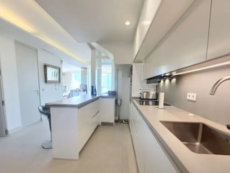 This exceptional triplex penthouse stands out as one of the most unique and meticulously designed properties in the Selwo area of Estepona. Its current owners, **renowned interior designers**, carried out a complete **bespoke, full-scale renovation**, ori