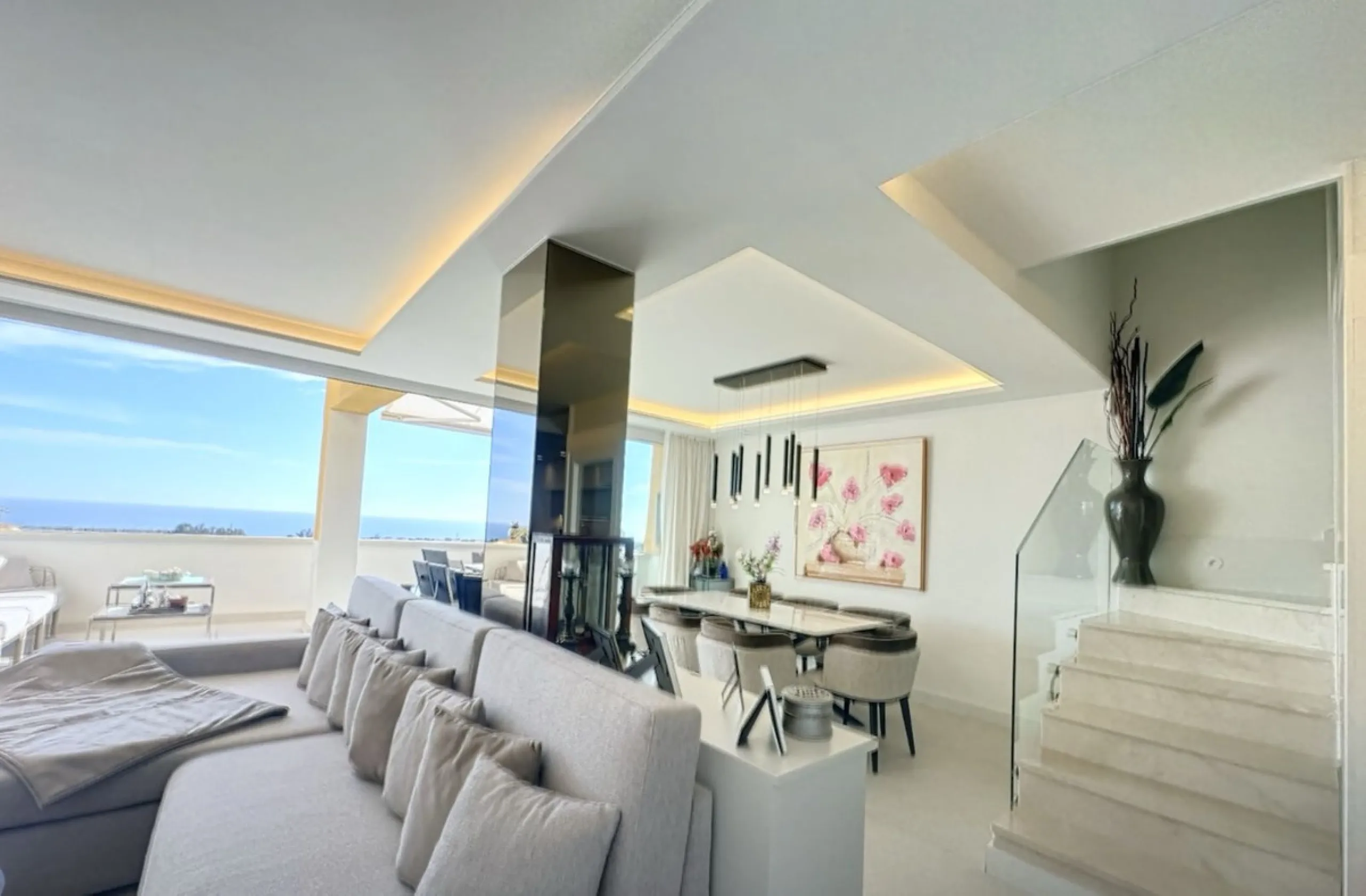 This exceptional triplex penthouse stands out as one of the most unique and meticulously designed properties in the Selwo area of Estepona. Its current owners, **renowned interior designers**, carried out a complete **bespoke, full-scale renovation**, ori