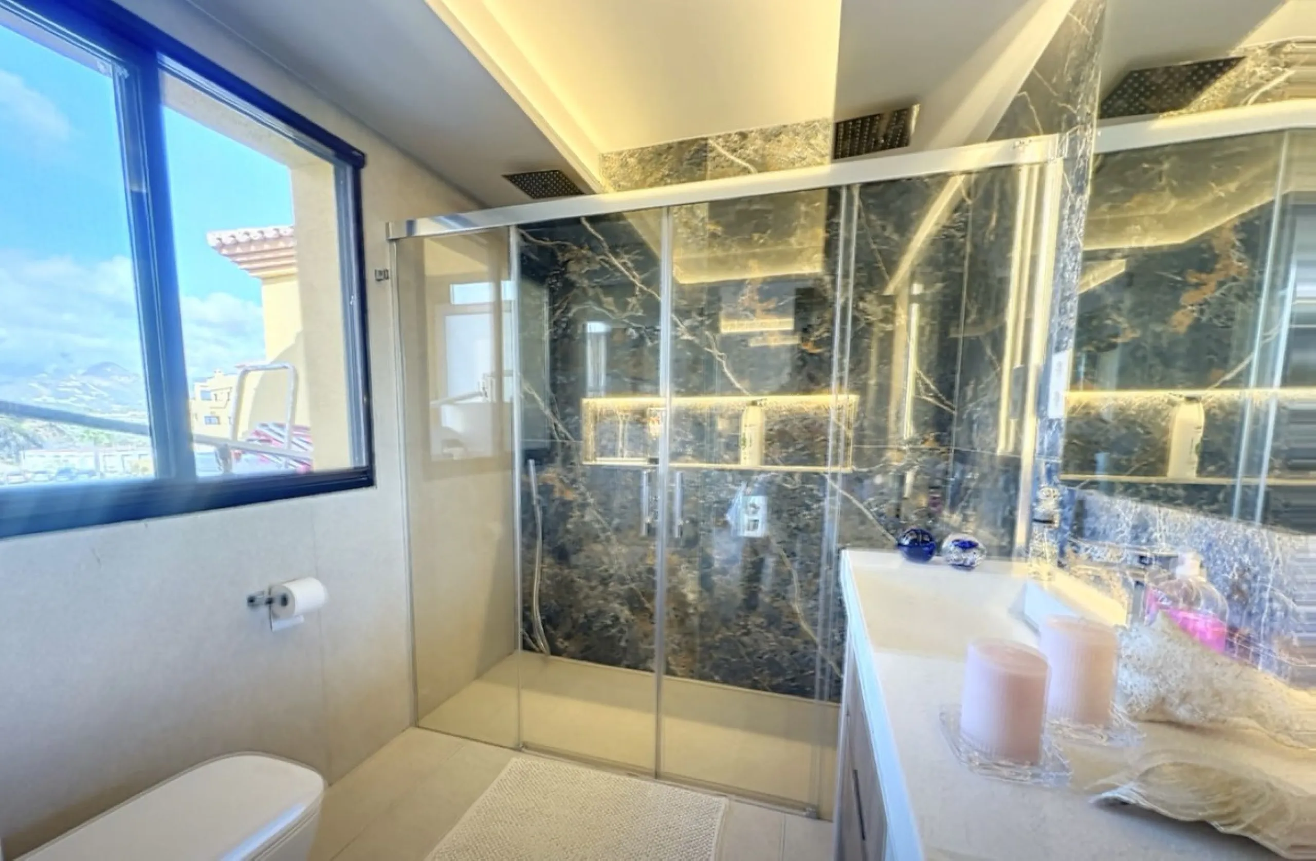 This exceptional triplex penthouse stands out as one of the most unique and meticulously designed properties in the Selwo area of Estepona. Its current owners, **renowned interior designers**, carried out a complete **bespoke, full-scale renovation**, ori