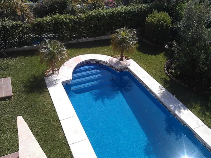 Located in the rolling hills of Mijas Costa, in the upper part of Riviera del Sol, this large villa offers the perfect balance of space, comfort, and convenience for family living. Positioned beside Cala Nova and right next to the exciting new One Bali Vi