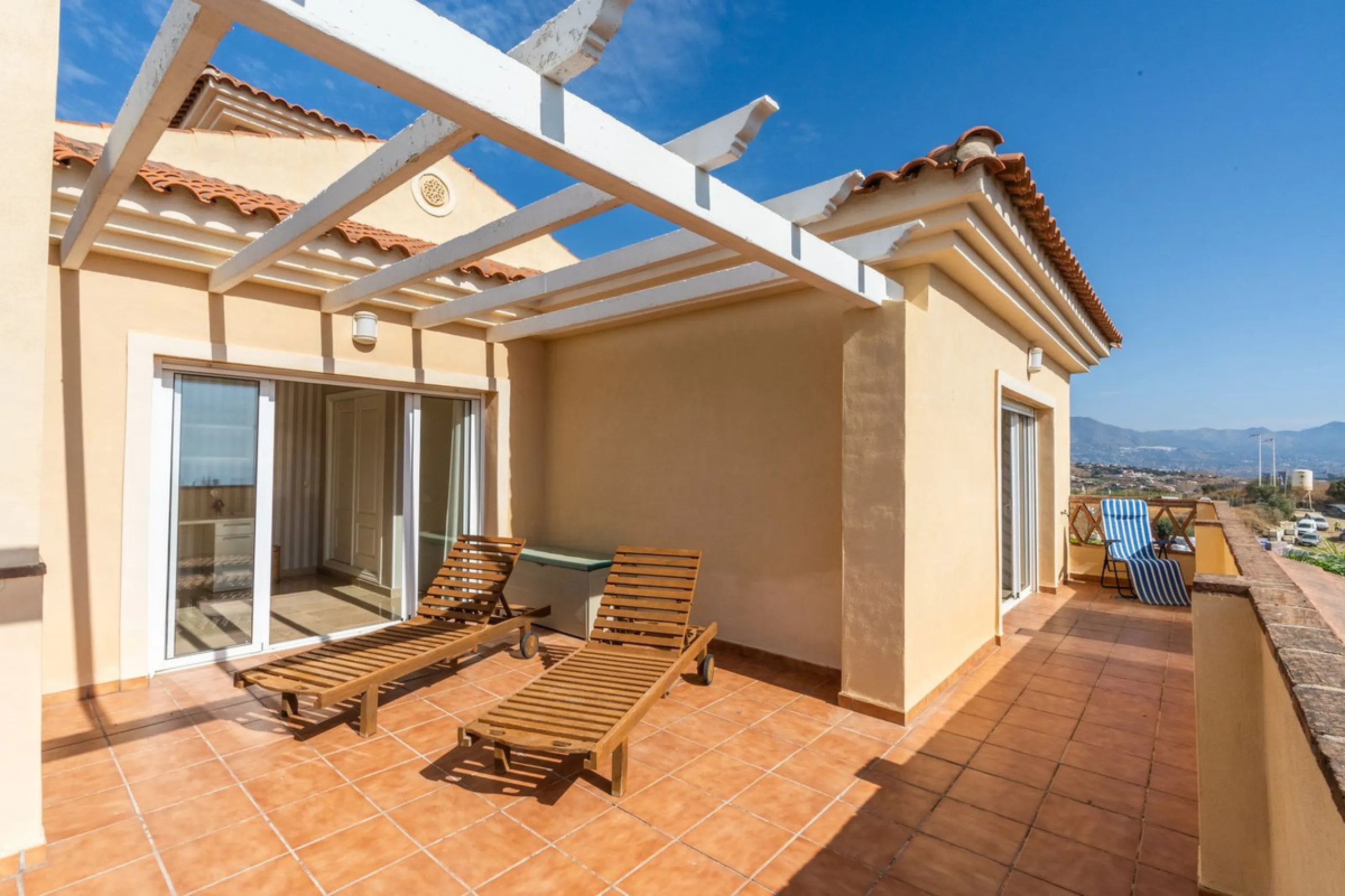 Located in the rolling hills of Mijas Costa, in the upper part of Riviera del Sol, this large villa offers the perfect balance of space, comfort, and convenience for family living. Positioned beside Cala Nova and right next to the exciting new One Bali Vi