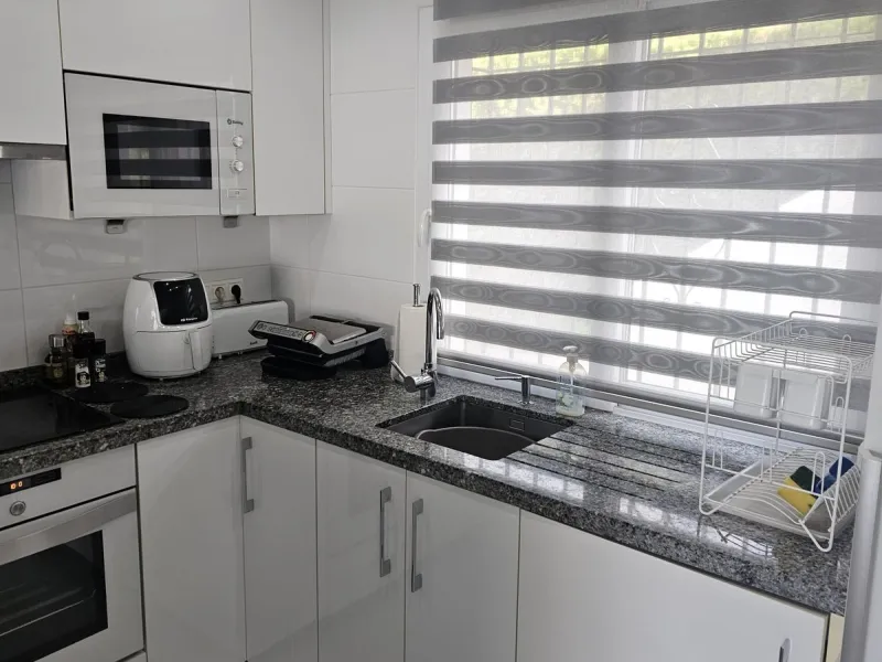 Ground floor garden apartment. Located on Calle Sirius in Riviera (lower part).