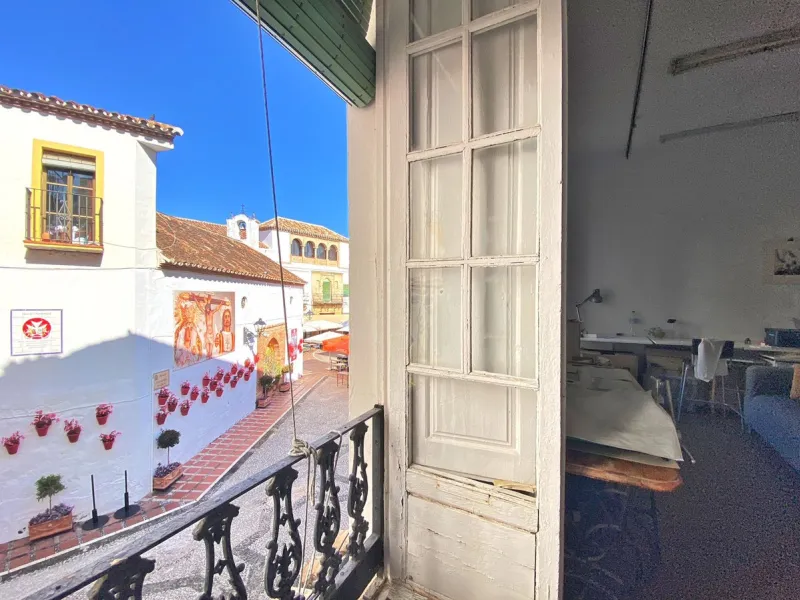 An iconic building in Marbella's old town, located in the heart of Plaza de los Naranjos.