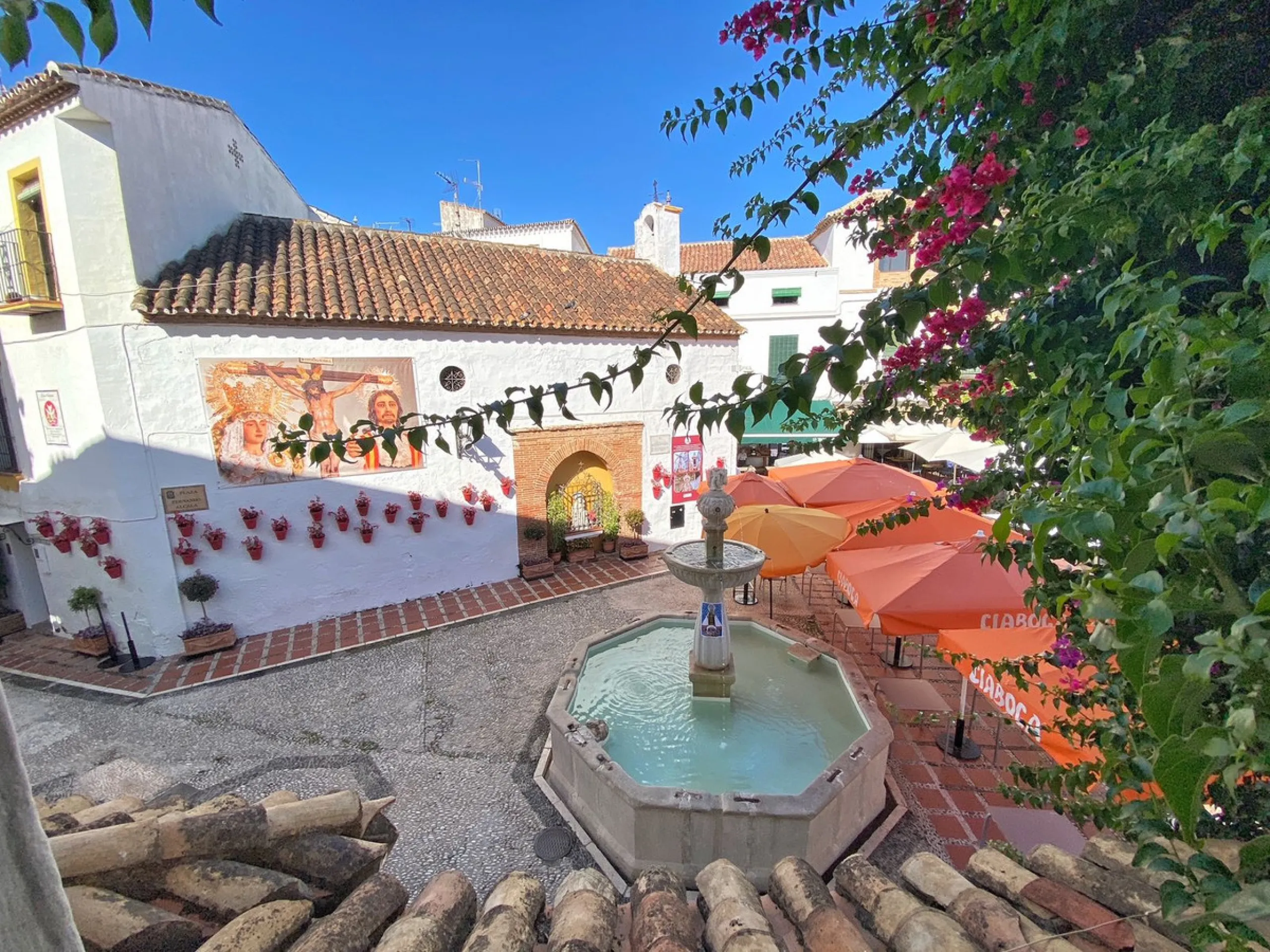 An iconic building in Marbella's old town, located in the heart of Plaza de los Naranjos.