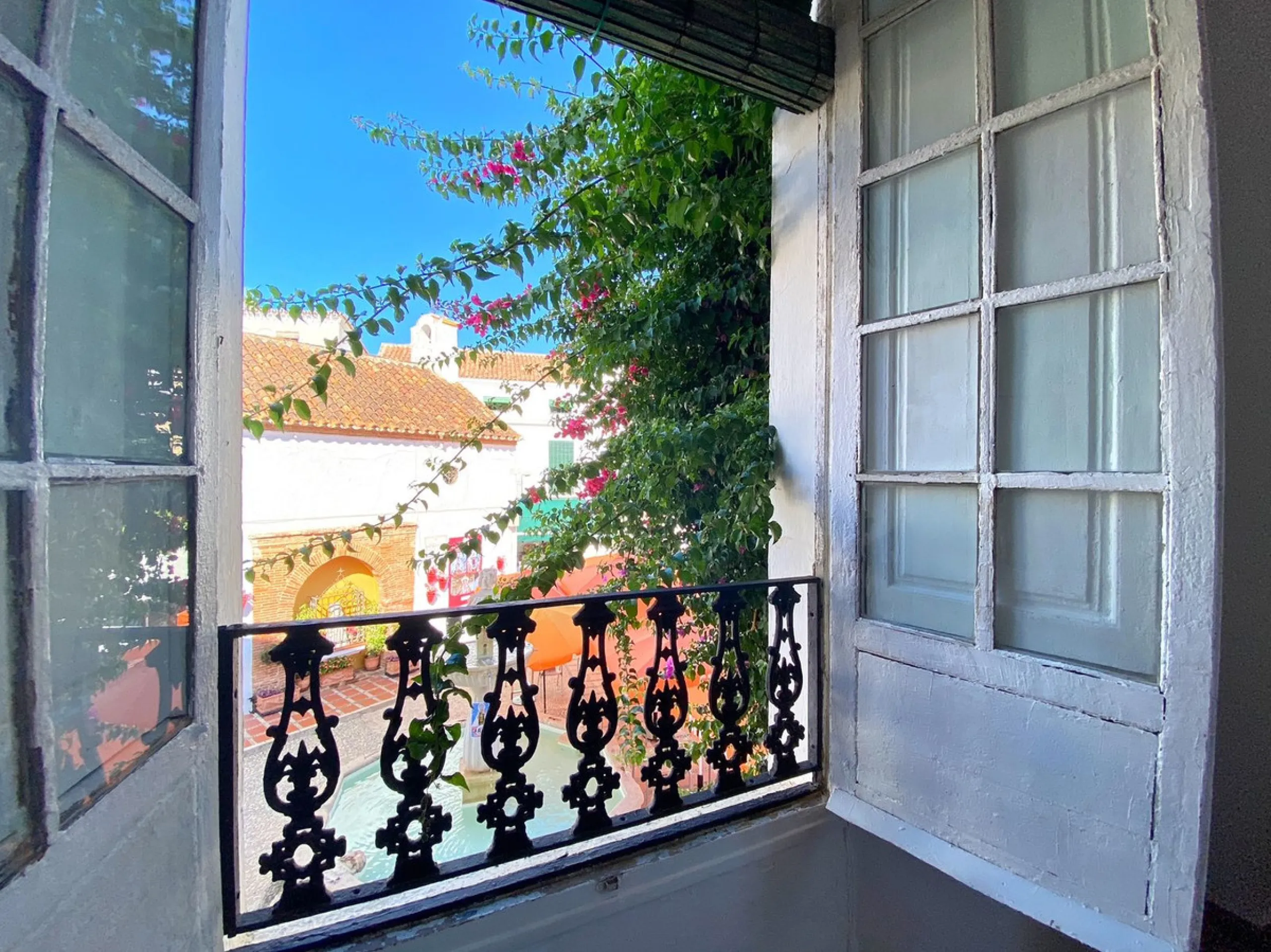 An iconic building in Marbella's old town, located in the heart of Plaza de los Naranjos.