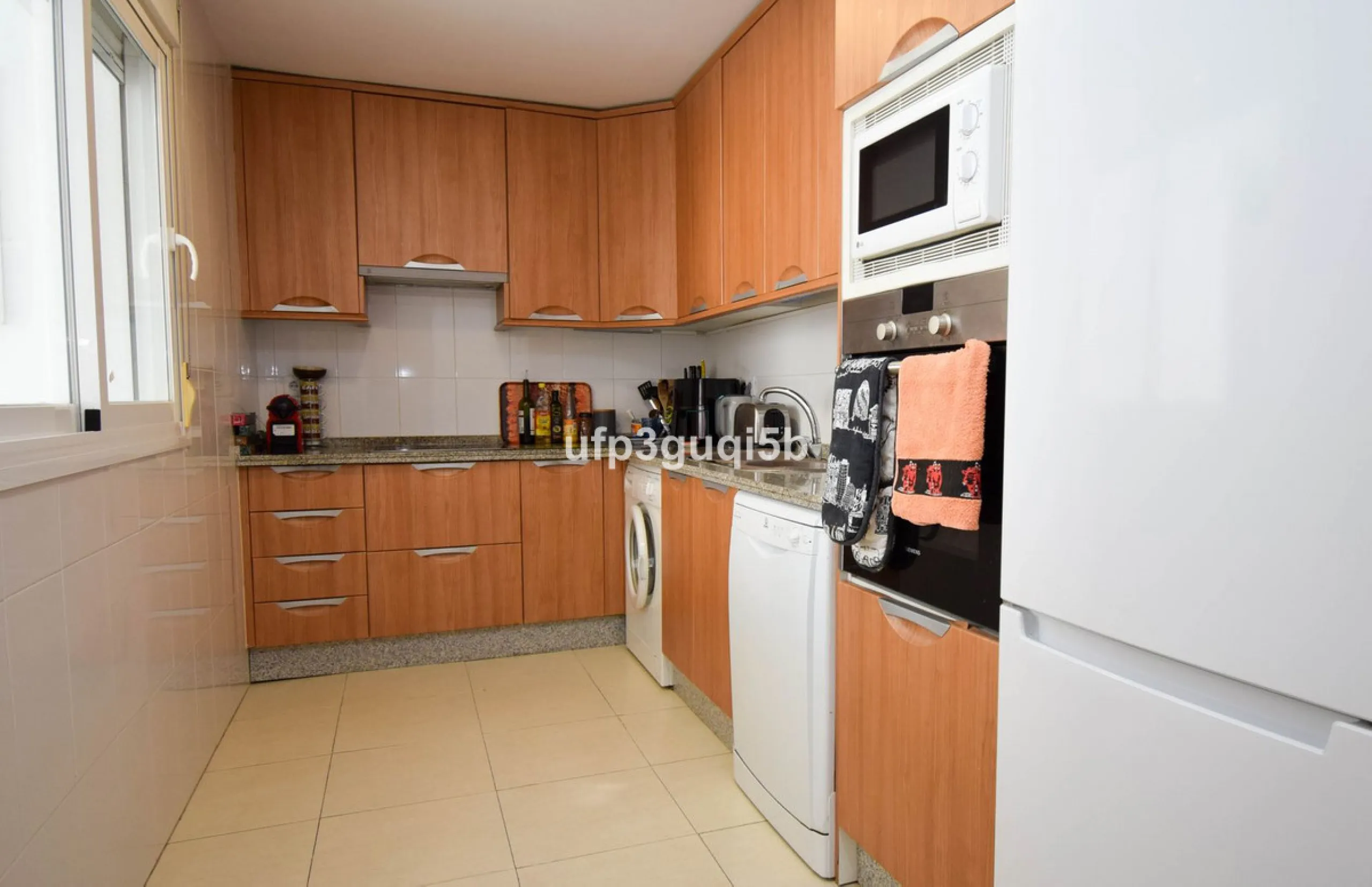 Spacious Top-Floor Apartment with Panoramic Views – Ideal for Residential Living or Investment