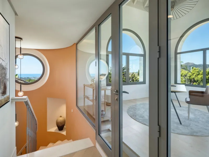 Villa Aguila is a remarkable villa for sale in Monte Halcones, Benahavís, offering a refined balance of modern elegance and timeless Andalusian character. Fully renovated in 2022, this three-story residence combines complete privacy with excellent connect