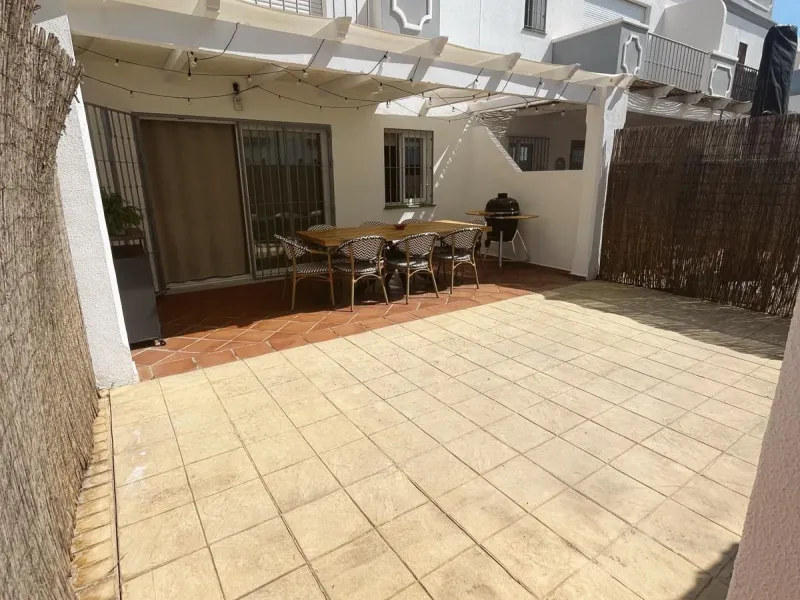 Prime Townhouse in Urb. Atalaya Golf with Rooftop Terrace & Sea Views – Exclusive Costa del Sol Living Surrounded by Golf Courses!