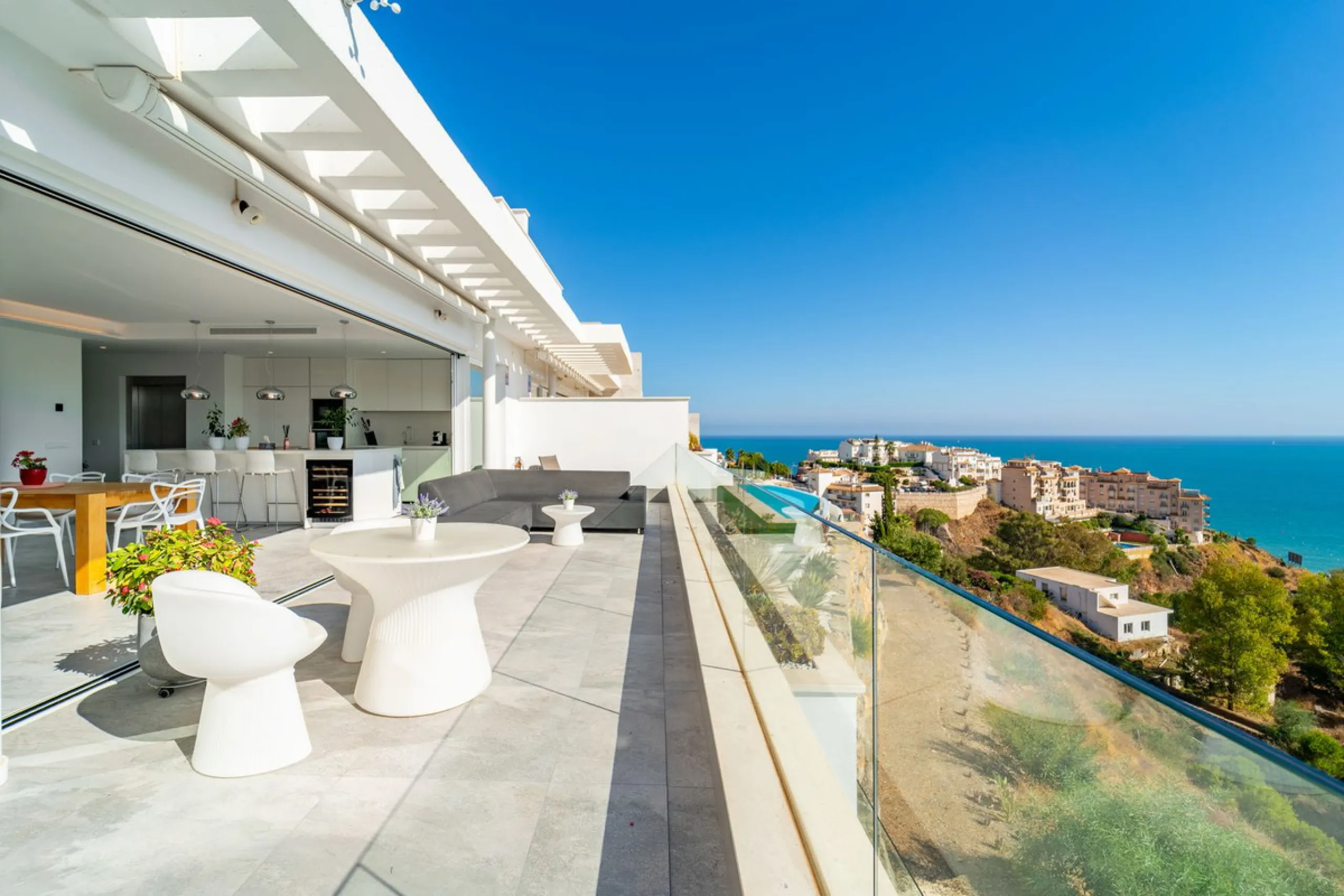 Welcome to this stunning penthouse apartment offering breathtaking panoramic sea views. Upon entering the property, either via the front door or personal lift, you will be immediately captivated by the magnificent panoramic sea views. The spacious living 