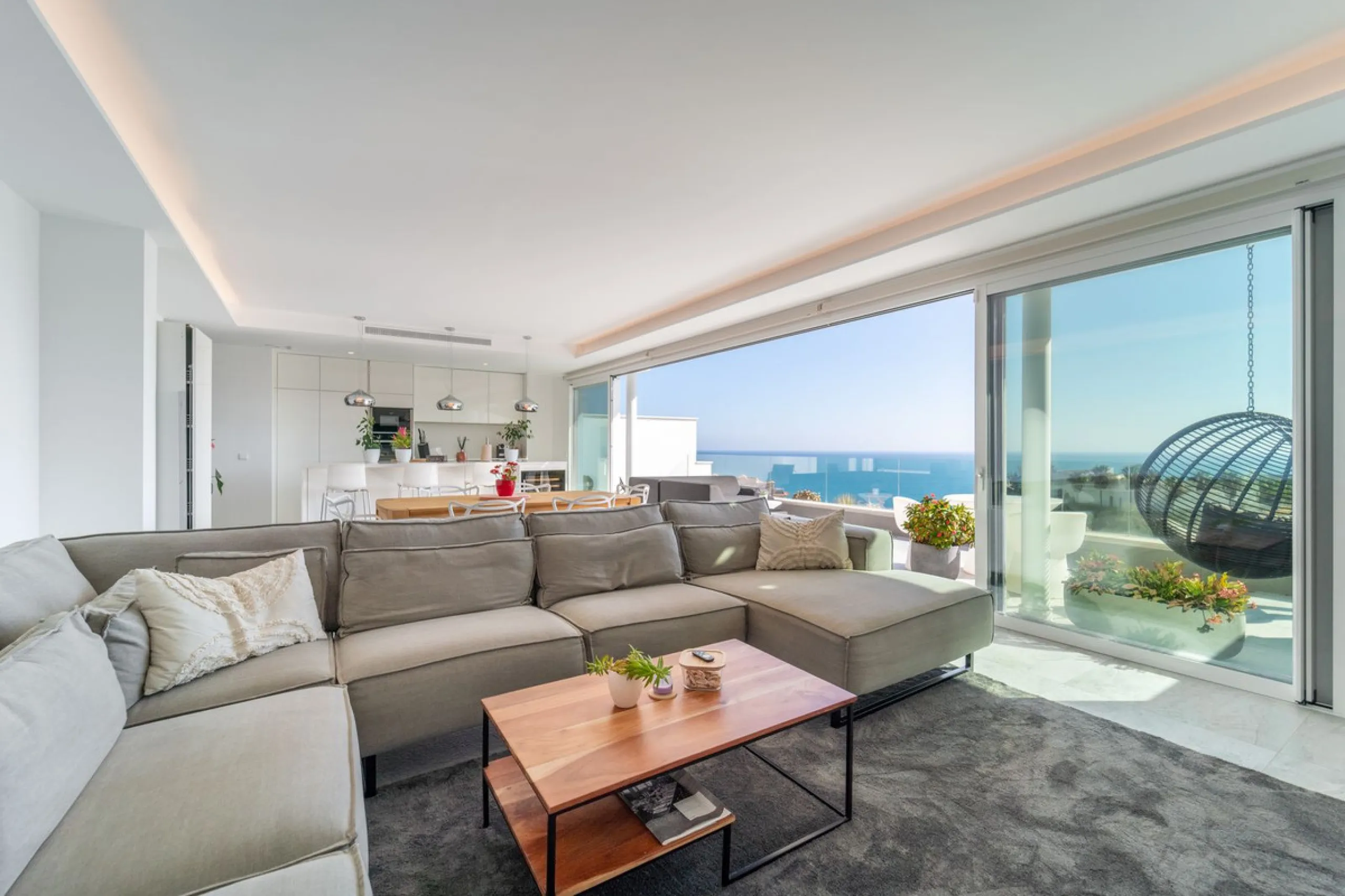 Welcome to this stunning penthouse apartment offering breathtaking panoramic sea views. Upon entering the property, either via the front door or personal lift, you will be immediately captivated by the magnificent panoramic sea views. The spacious living 
