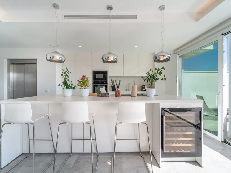 Welcome to this stunning penthouse apartment offering breathtaking panoramic sea views. Upon entering the property, either via the front door or personal lift, you will be immediately captivated by the magnificent panoramic sea views. The spacious living 