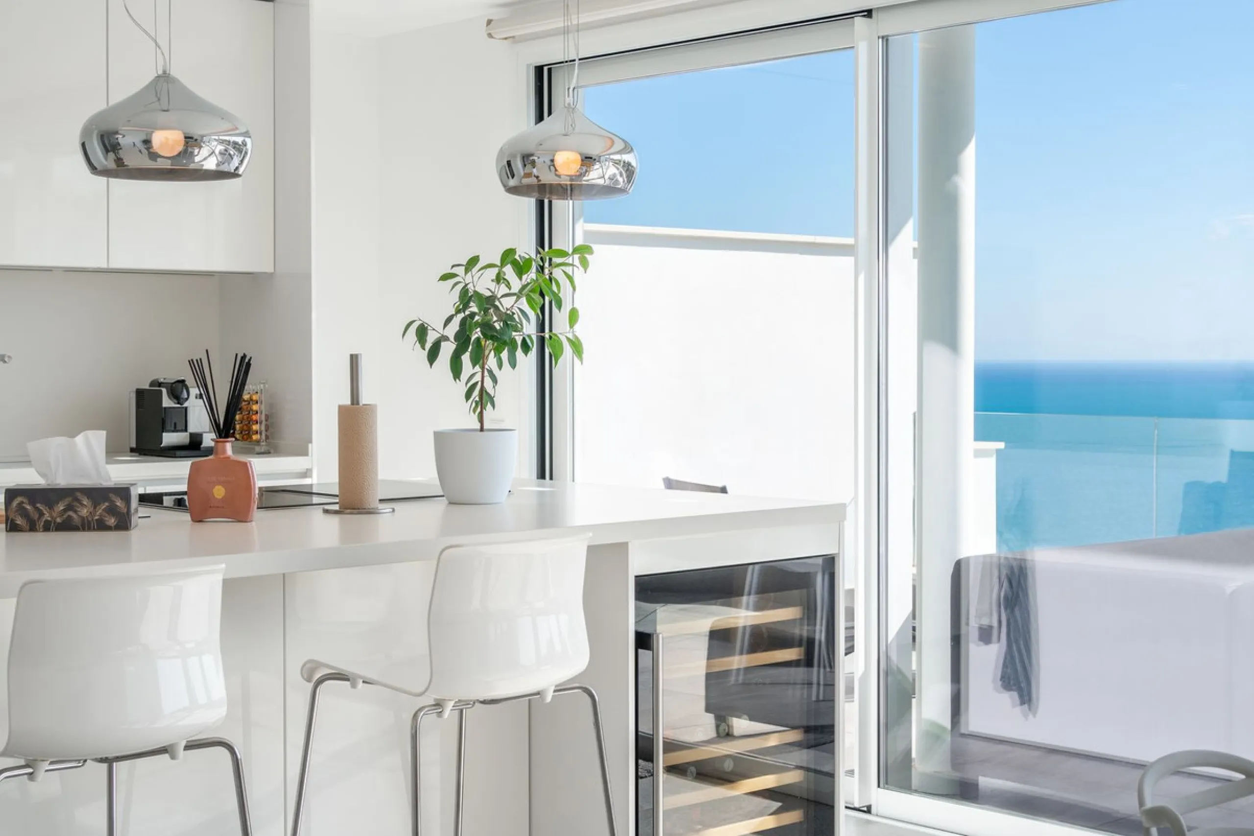 Welcome to this stunning penthouse apartment offering breathtaking panoramic sea views. Upon entering the property, either via the front door or personal lift, you will be immediately captivated by the magnificent panoramic sea views. The spacious living 