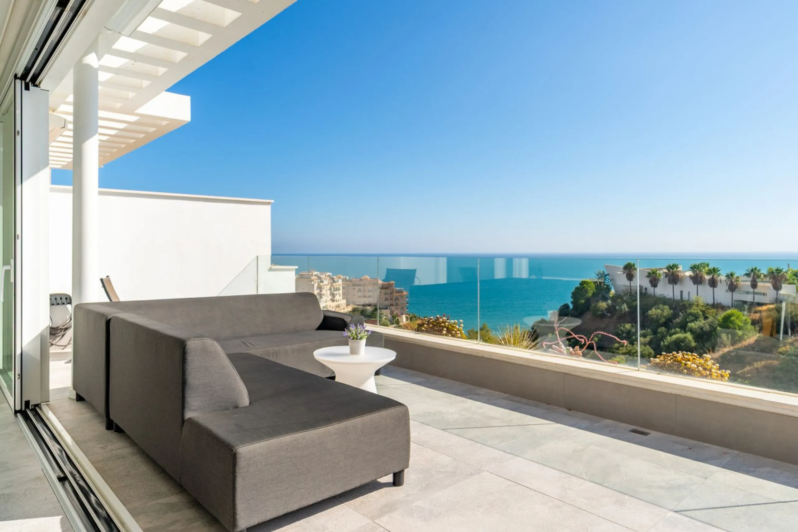 Welcome to this stunning penthouse apartment offering breathtaking panoramic sea views. Upon entering the property, either via the front door or personal lift, you will be immediately captivated by the magnificent panoramic sea views. The spacious living 