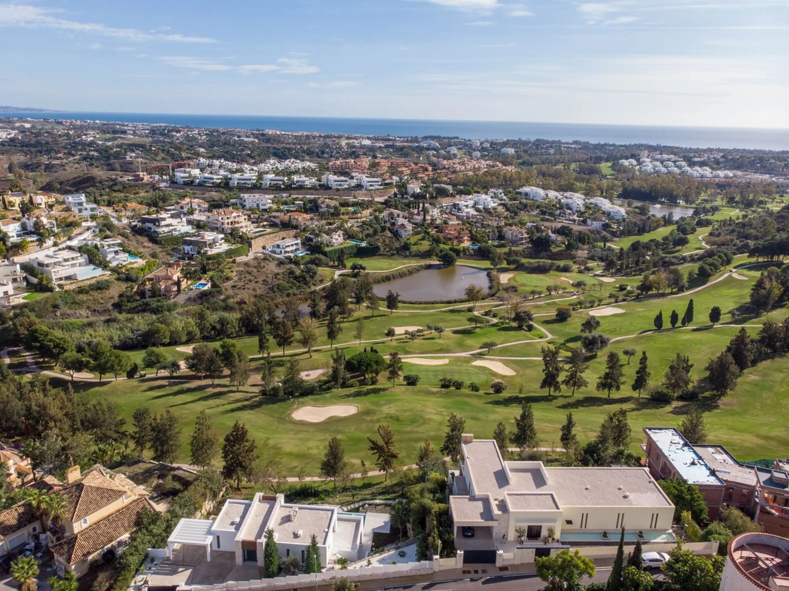 Stunning contemporary villa with panoramic mountain, golf and sea views in La Alqueria, Benahavis