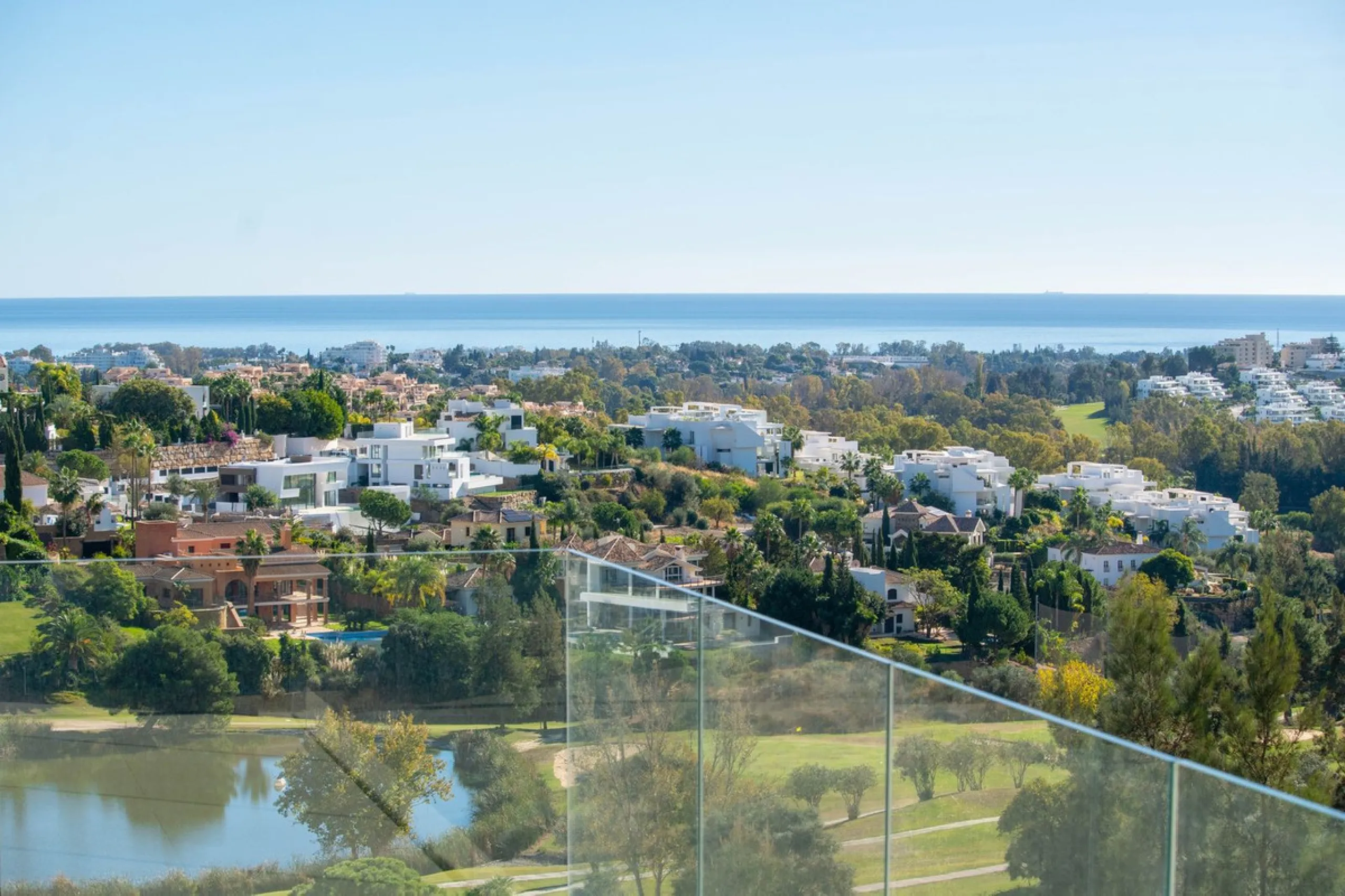 Stunning contemporary villa with panoramic mountain, golf and sea views in La Alqueria, Benahavis
