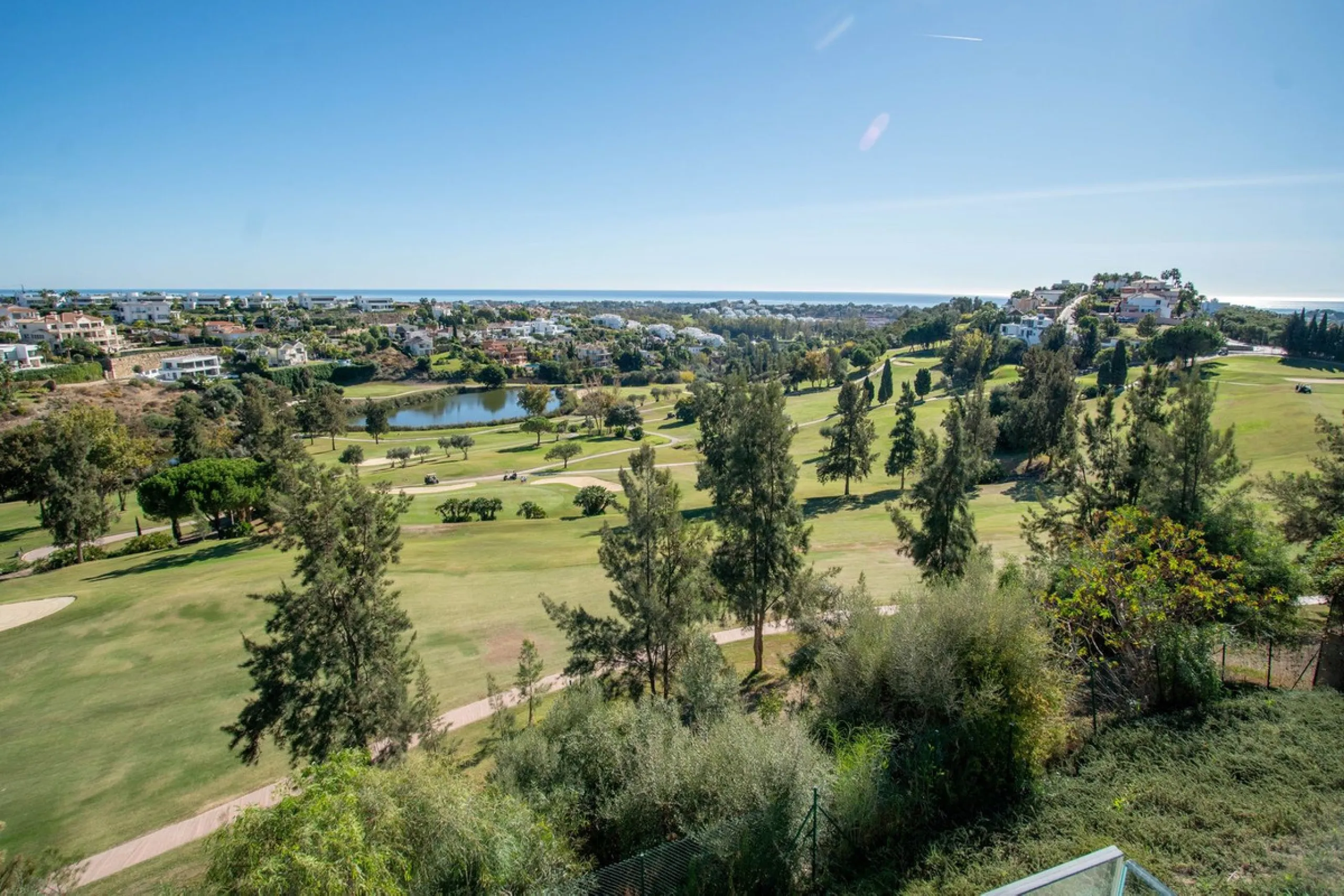 Stunning contemporary villa with panoramic mountain, golf and sea views in La Alqueria, Benahavis