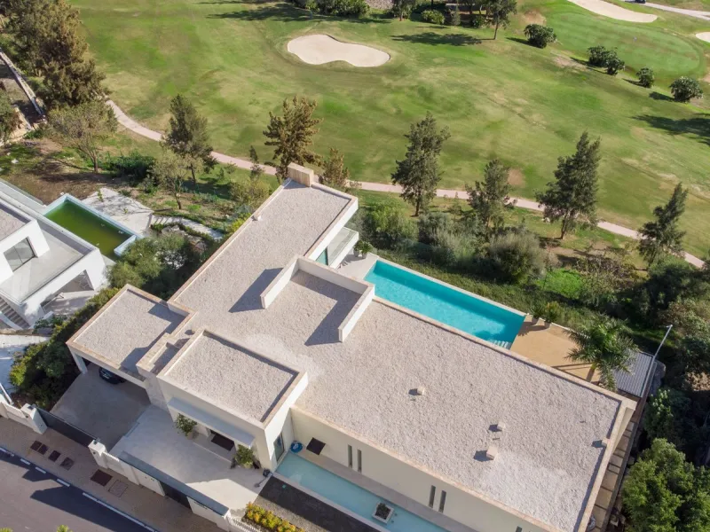 Stunning contemporary villa with panoramic mountain, golf and sea views in La Alqueria, Benahavis