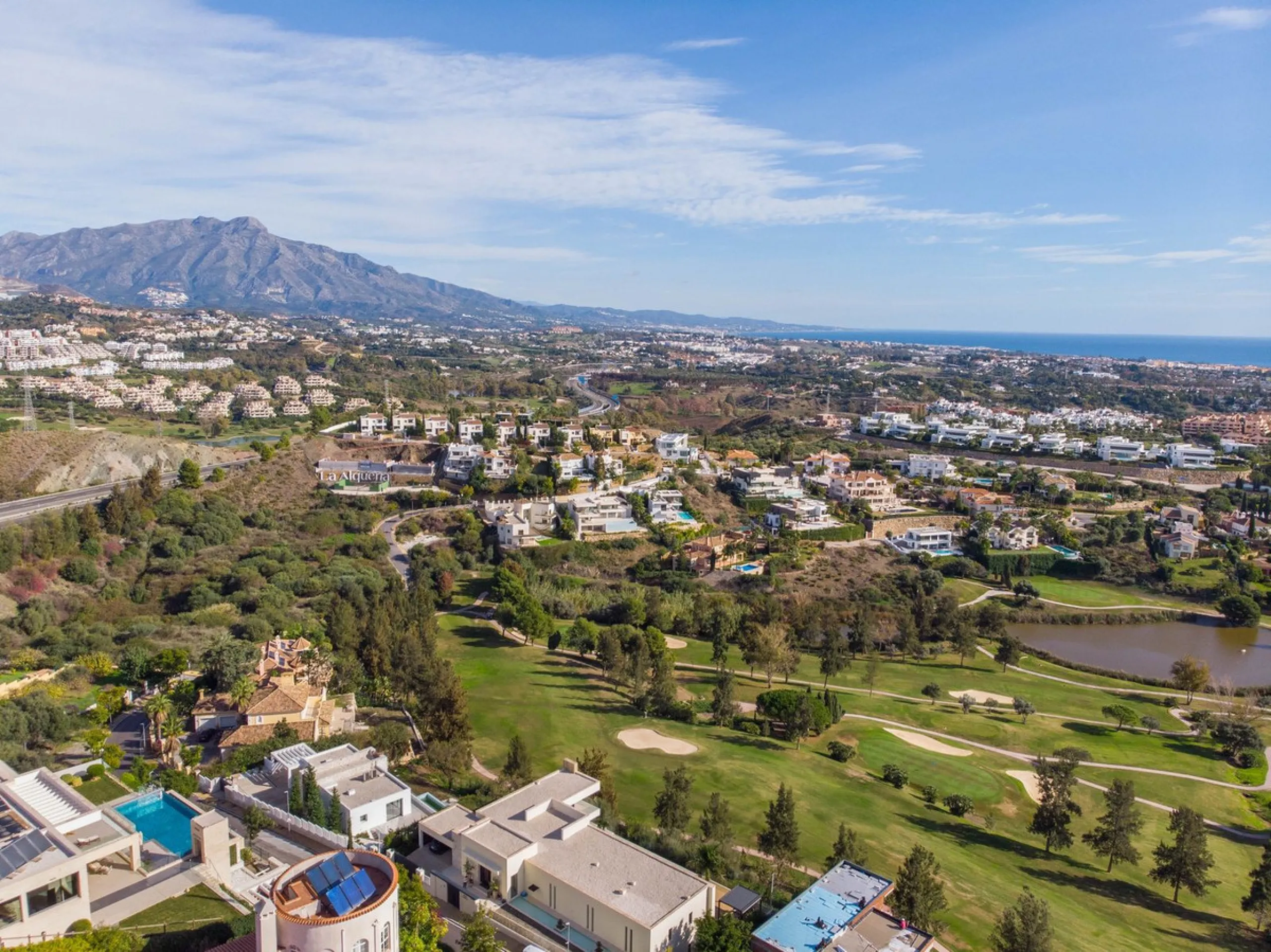 Stunning contemporary villa with panoramic mountain, golf and sea views in La Alqueria, Benahavis