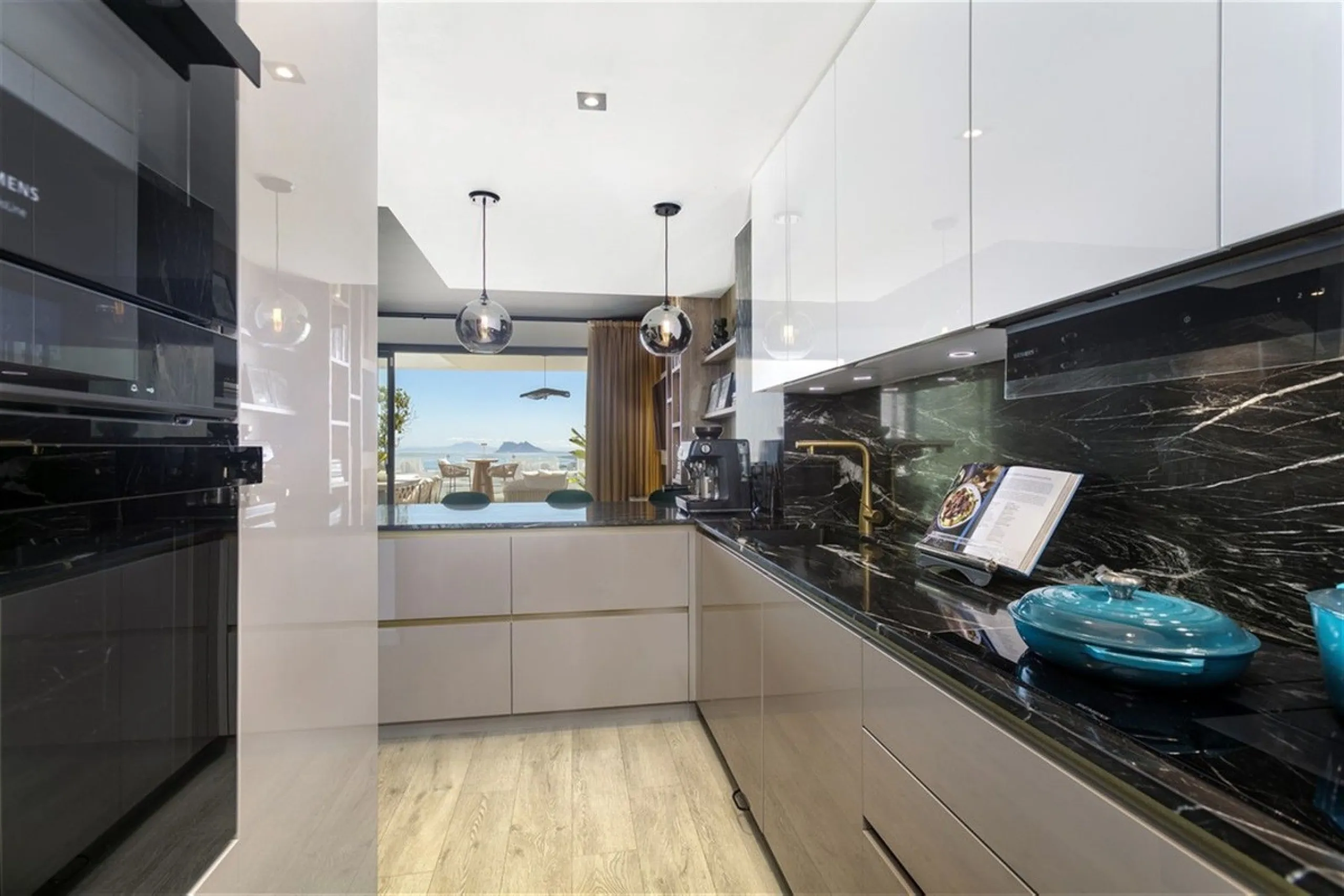 Contemporary and luxurious four level family home offering stunning panoramic views only 10 minutes to Sotogrande.