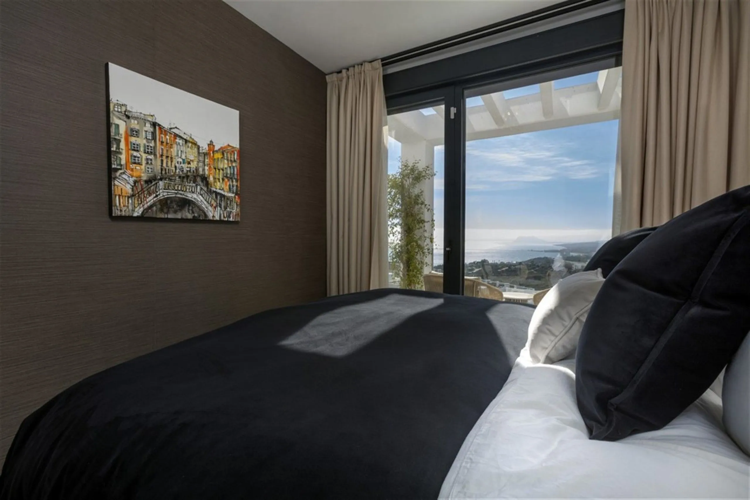 Contemporary and luxurious four level family home offering stunning panoramic views only 10 minutes to Sotogrande.