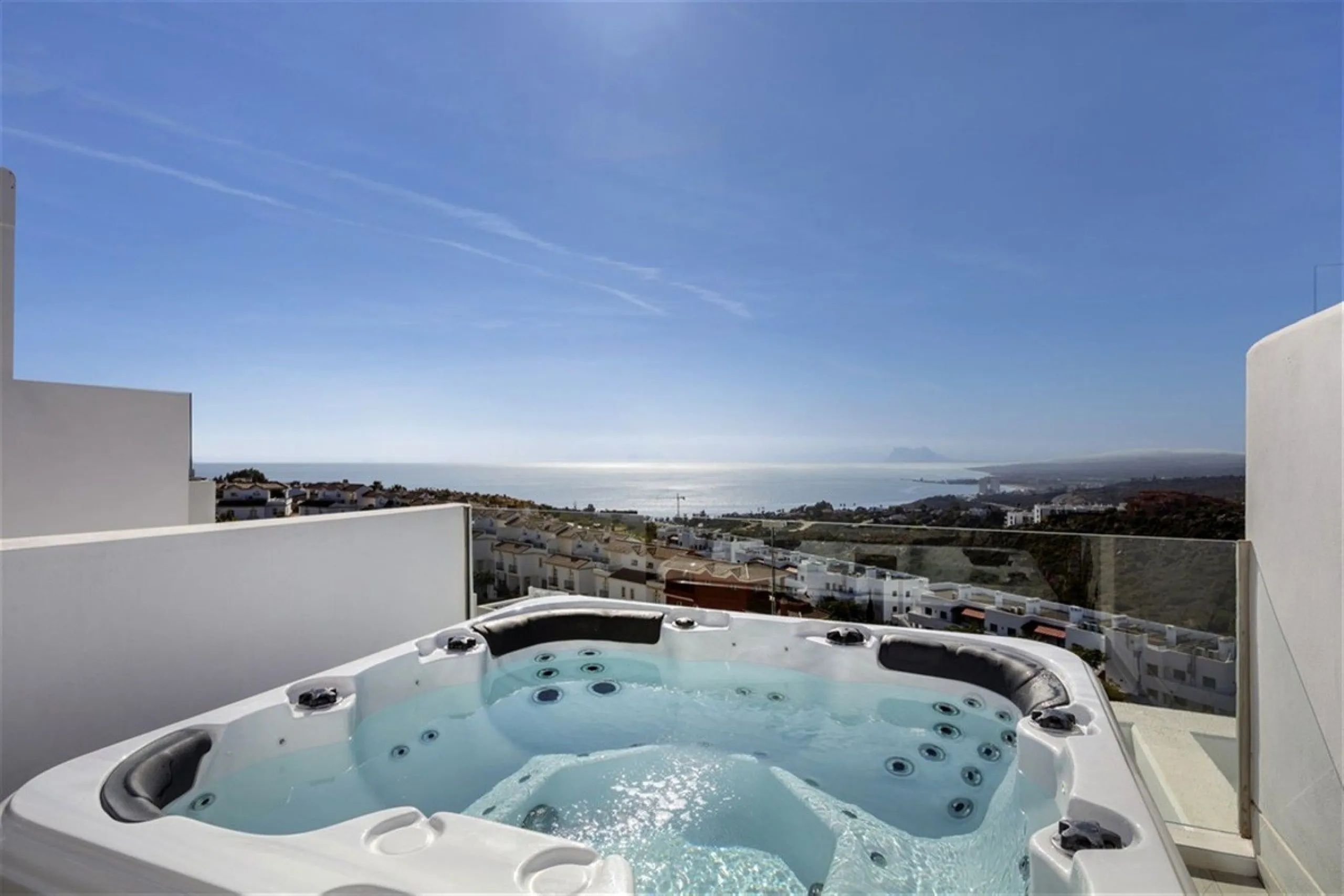 Contemporary and luxurious four level family home offering stunning panoramic views only 10 minutes to Sotogrande.