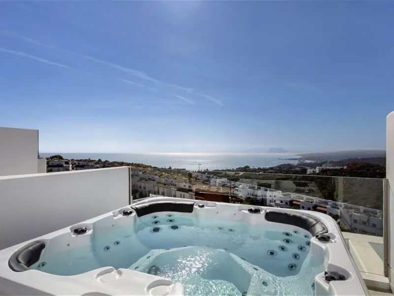 Contemporary and luxurious four level family home offering stunning panoramic views only 10 minutes to Sotogrande.
