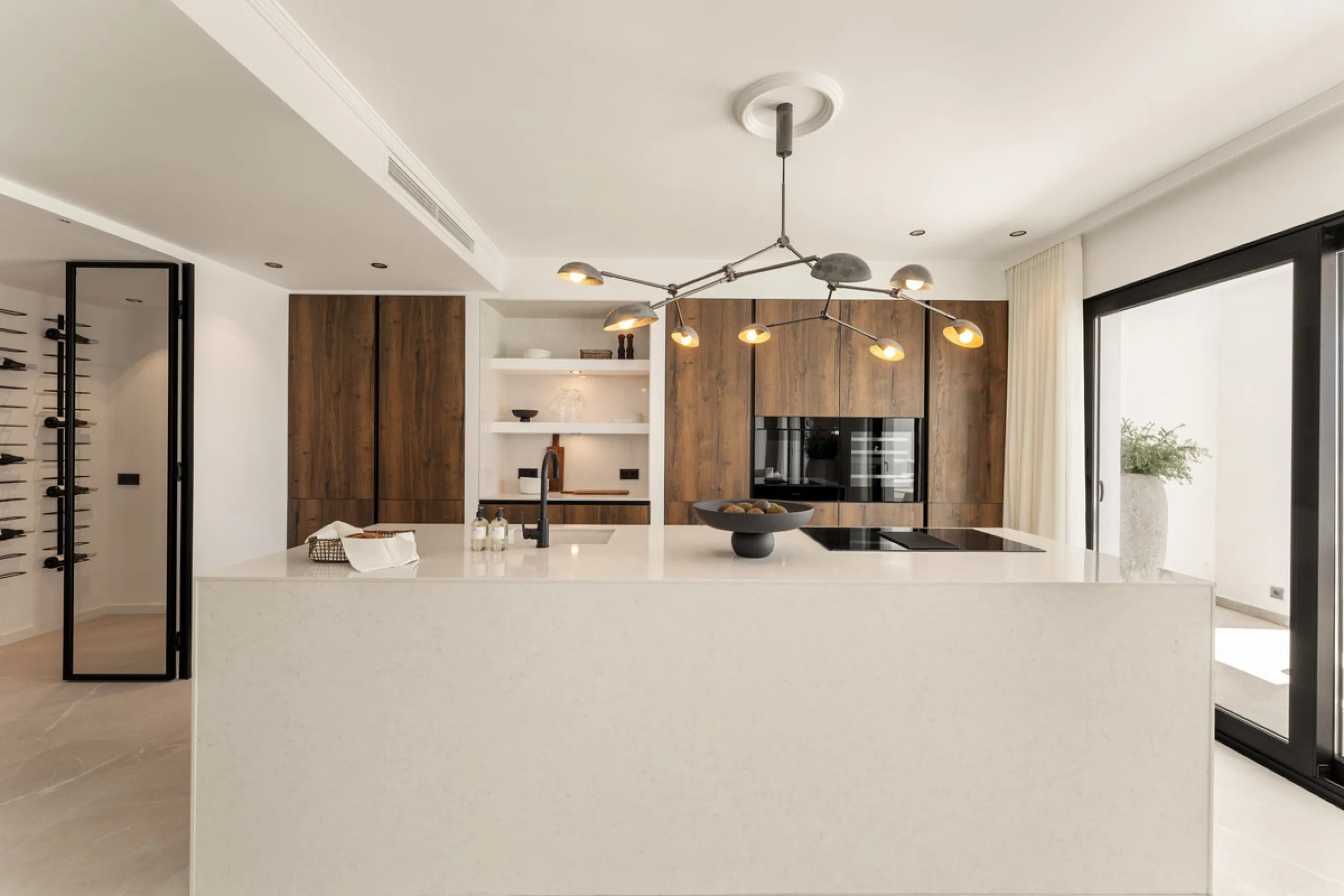 Contemporary duplex for sale in the exclusive Las Colinas de Marbella community in Benahavís, offering three bedrooms and three bathroom.  Designed with both style and function in mind, this home brings together modern living spaces with panoramic sea and