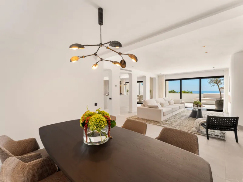Contemporary duplex for sale in the exclusive Las Colinas de Marbella community in Benahavís, offering three bedrooms and three bathroom.  Designed with both style and function in mind, this home brings together modern living spaces with panoramic sea and