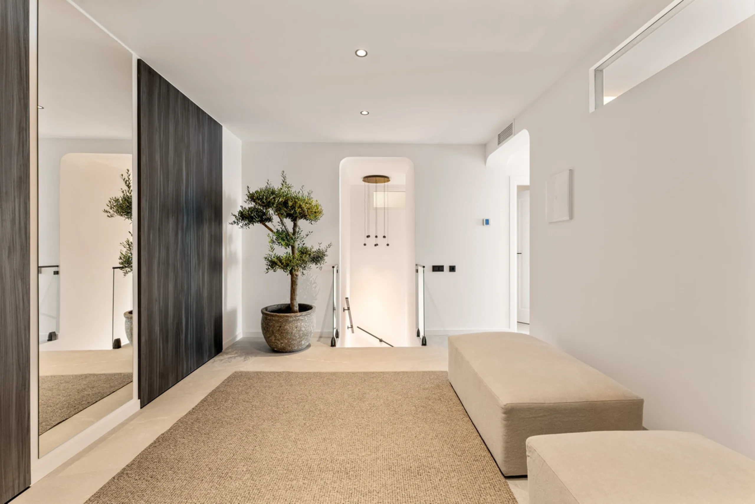 Contemporary duplex for sale in the exclusive Las Colinas de Marbella community in Benahavís, offering three bedrooms and three bathroom.  Designed with both style and function in mind, this home brings together modern living spaces with panoramic sea and