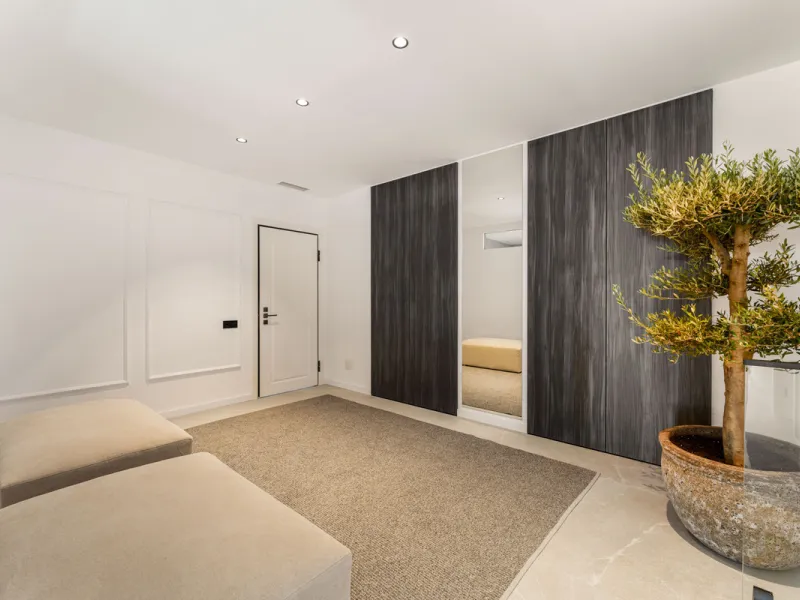 Contemporary duplex for sale in the exclusive Las Colinas de Marbella community in Benahavís, offering three bedrooms and three bathroom.  Designed with both style and function in mind, this home brings together modern living spaces with panoramic sea and