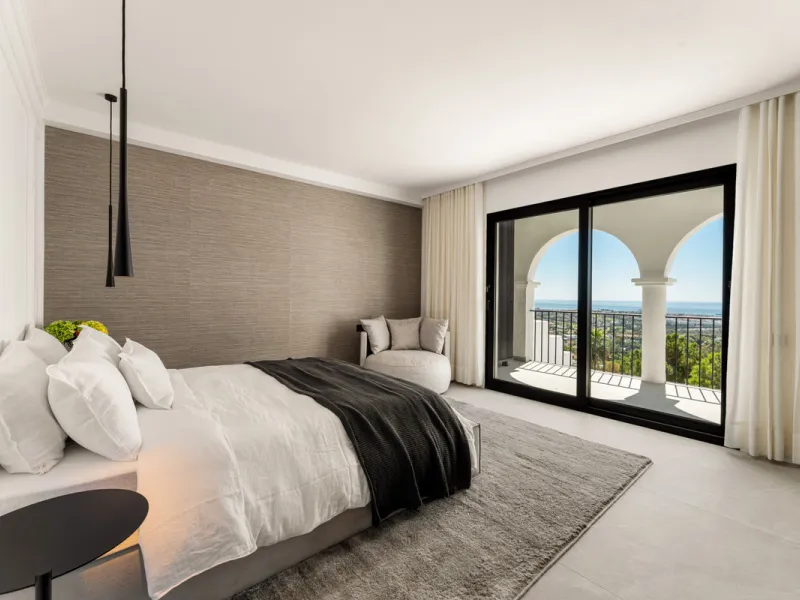 Contemporary duplex for sale in the exclusive Las Colinas de Marbella community in Benahavís, offering three bedrooms and three bathroom.  Designed with both style and function in mind, this home brings together modern living spaces with panoramic sea and