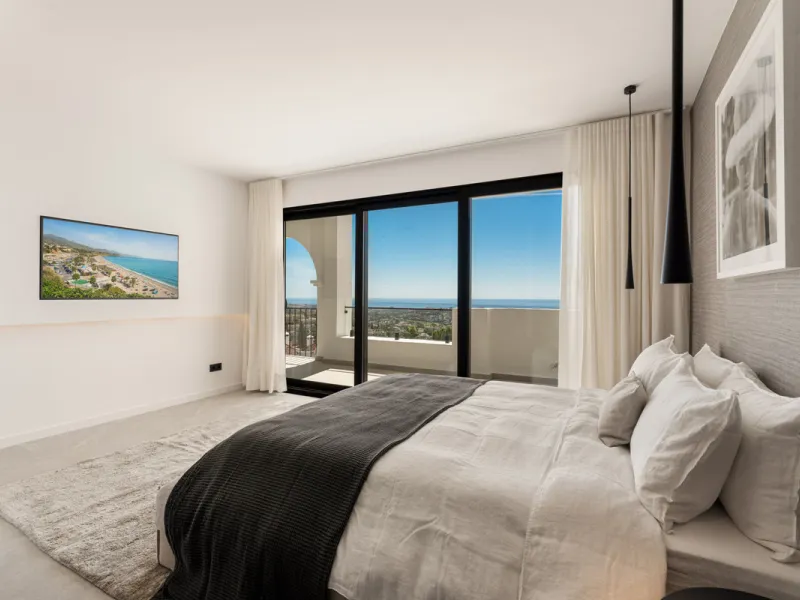 Contemporary duplex for sale in the exclusive Las Colinas de Marbella community in Benahavís, offering three bedrooms and three bathroom.  Designed with both style and function in mind, this home brings together modern living spaces with panoramic sea and