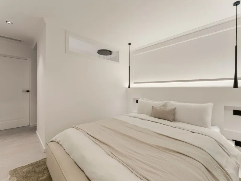 Contemporary duplex for sale in the exclusive Las Colinas de Marbella community in Benahavís, offering three bedrooms and three bathroom.  Designed with both style and function in mind, this home brings together modern living spaces with panoramic sea and