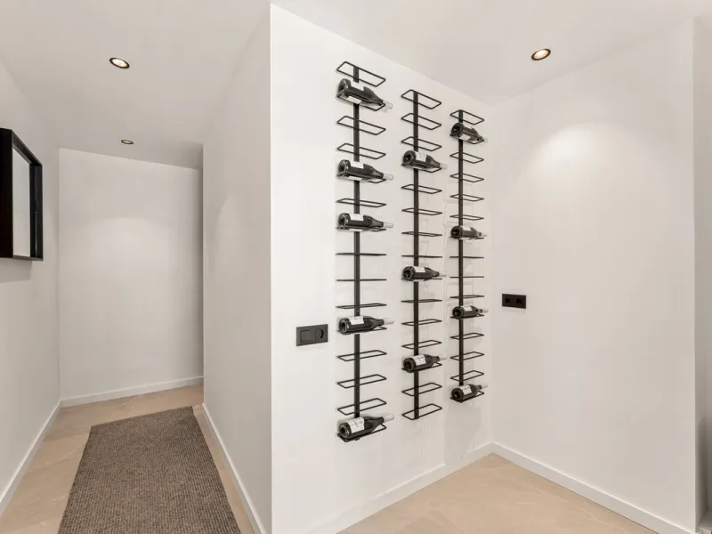 Contemporary duplex for sale in the exclusive Las Colinas de Marbella community in Benahavís, offering three bedrooms and three bathroom.  Designed with both style and function in mind, this home brings together modern living spaces with panoramic sea and